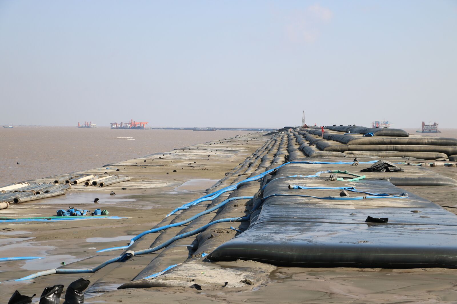 Canon EOS 750D (EOS Rebel T6i / EOS Kiss X8i) sample photo. The levee, sandbag, reclamation photography