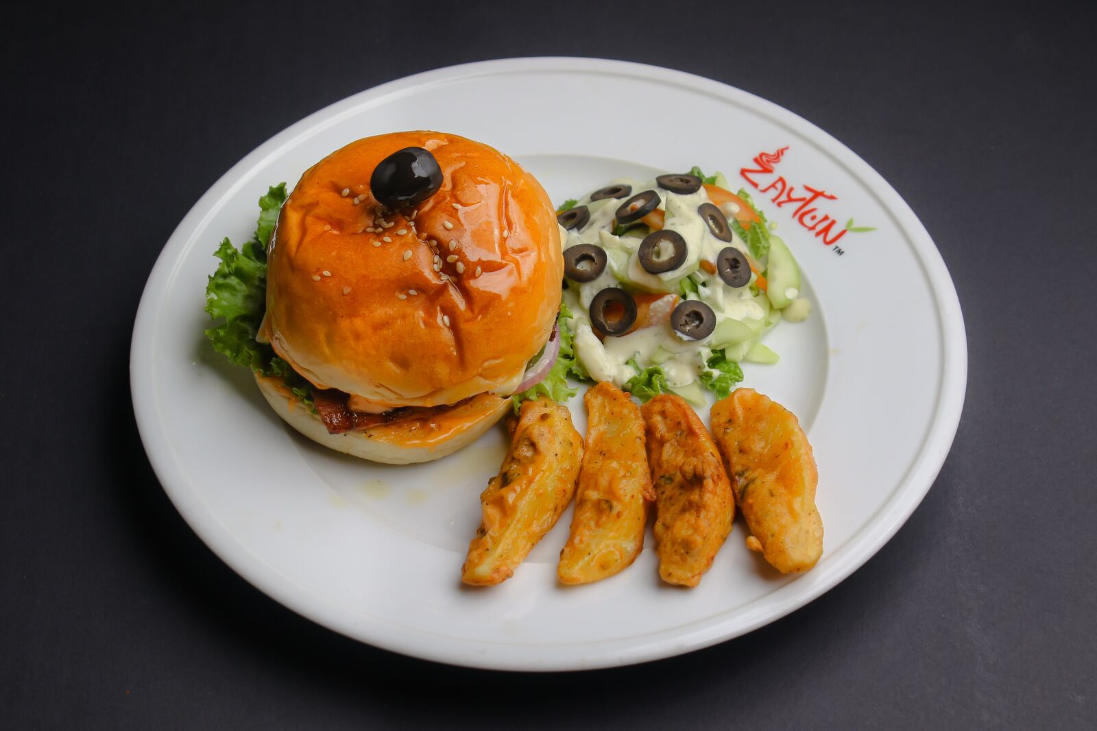 Canon EOS 7D Mark II + Canon EF-S 18-55mm F3.5-5.6 IS II sample photo. Burger, spicy, healthy photography