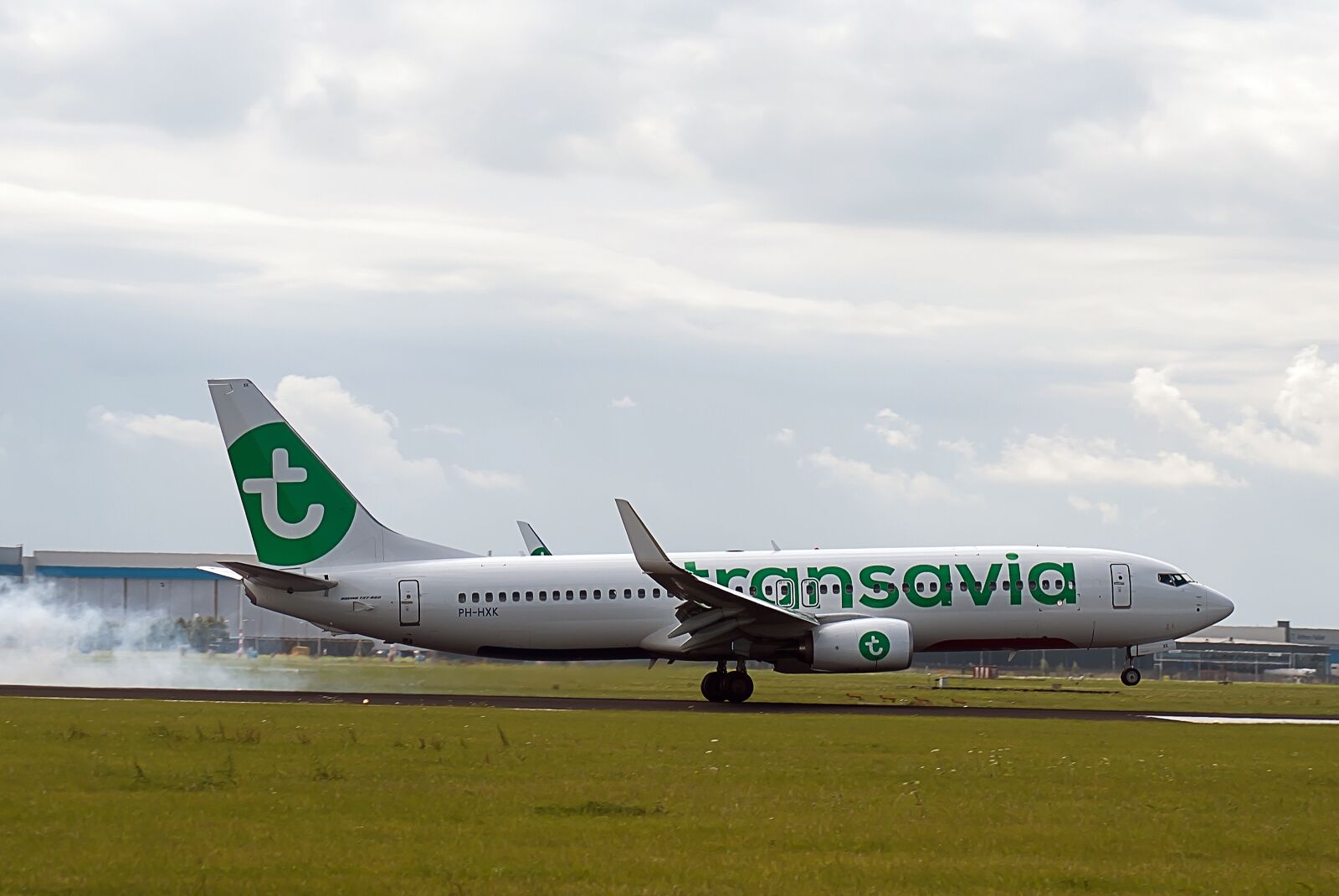 Nikon D3000 sample photo. Plane, runway, airline photography