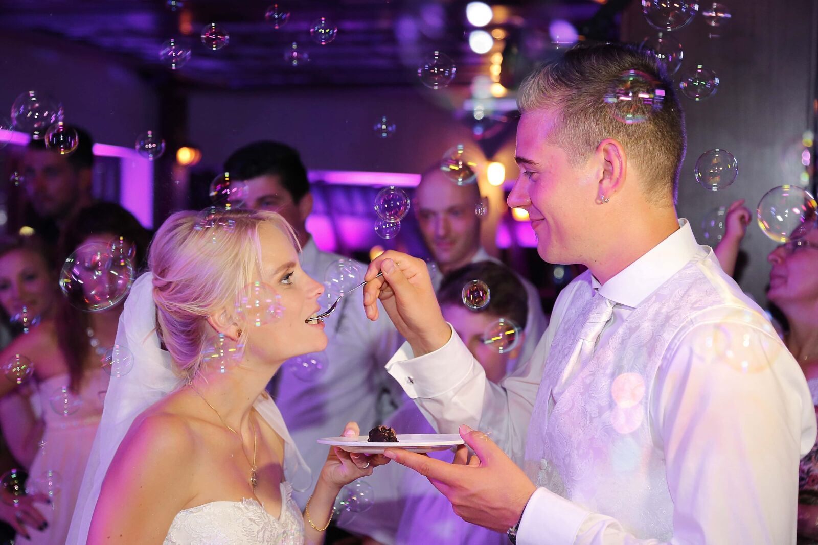 Canon EF 24-105mm F4L IS USM sample photo. Bride, groom, feeding, wedding photography