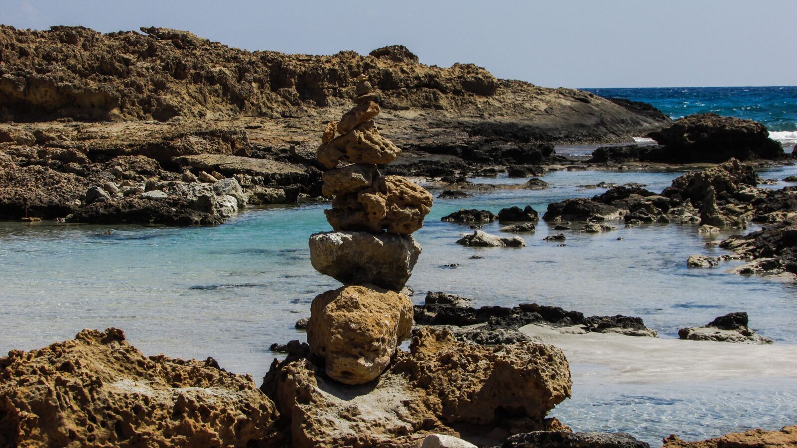 Canon PowerShot SX400 IS sample photo. Stones, beach, sea photography