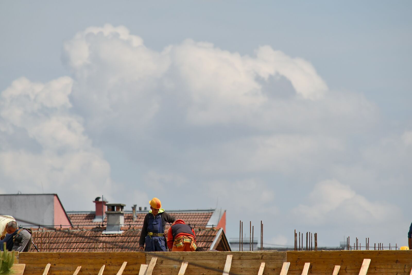 Nikon D5500 sample photo. Buildings, construction worker, wires photography