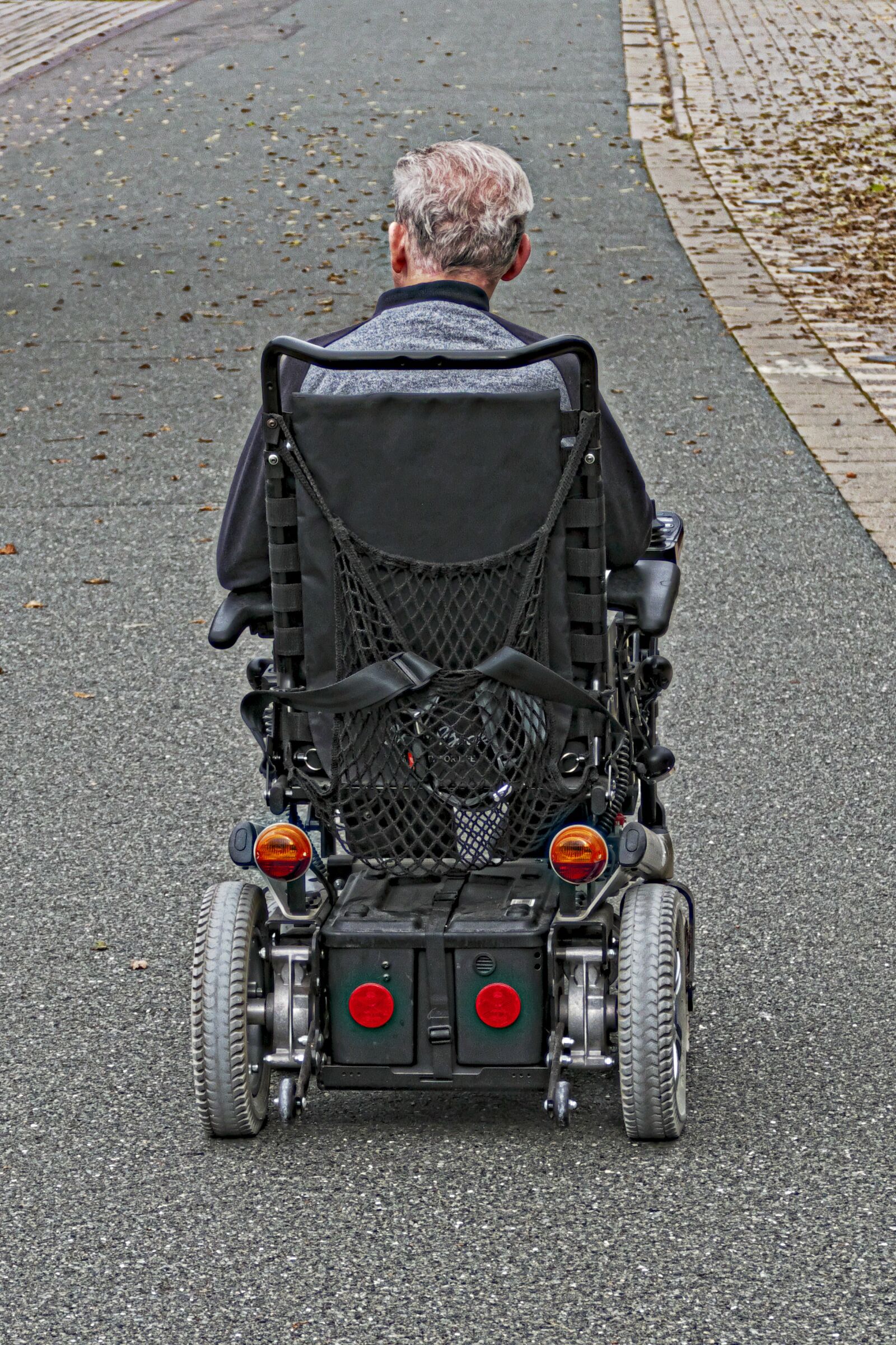 Panasonic Lumix DMC-FZ1000 sample photo. Wheelchair users, wheelchair, electric photography