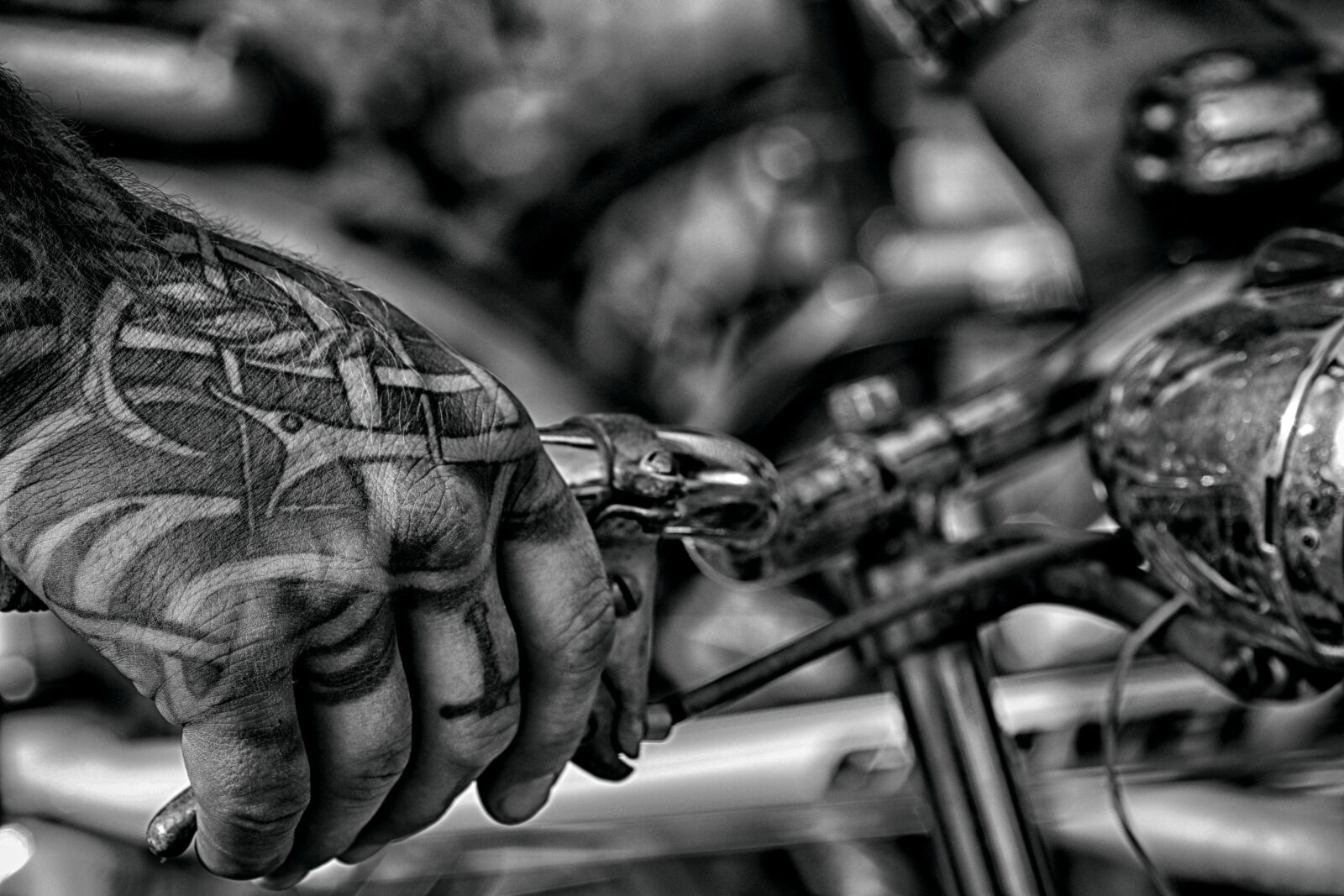 Canon EOS 7D Mark II + Canon EF 135mm F2L USM sample photo. Hand, bike, steering wheel photography