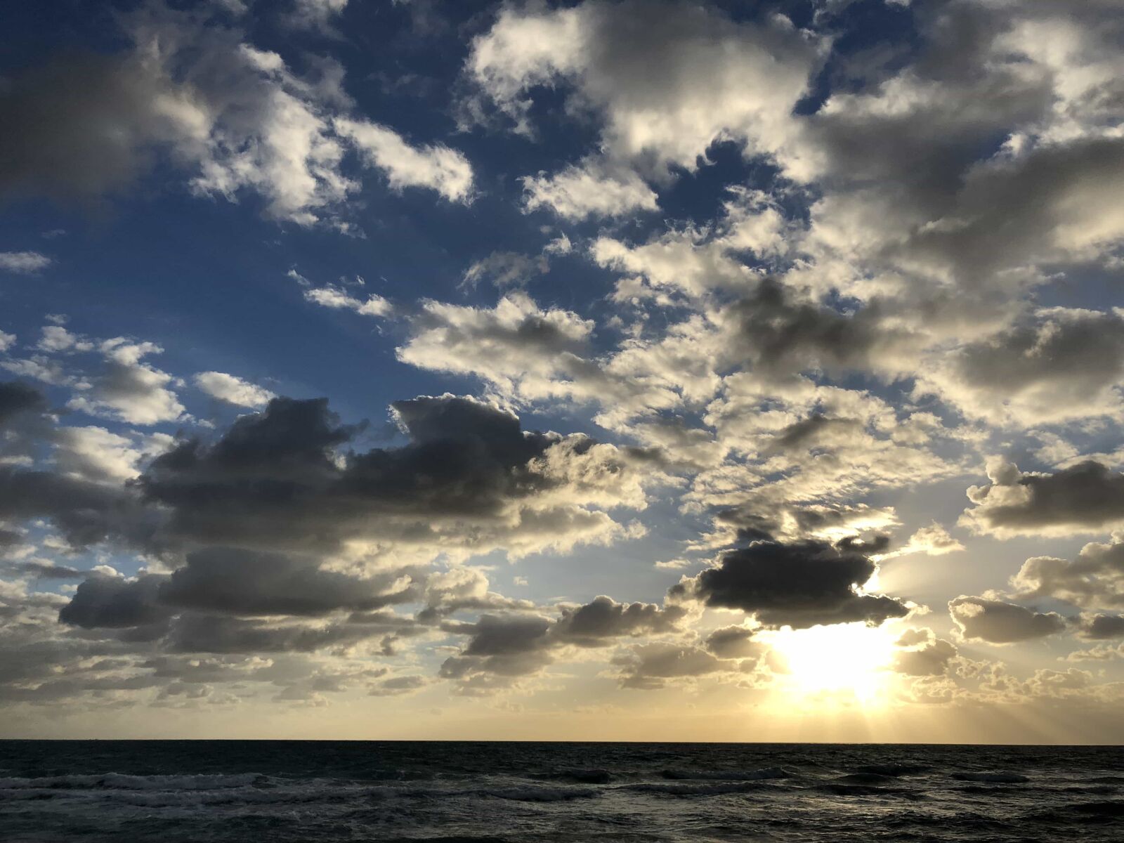 iPhone X back dual camera 4mm f/1.8 sample photo. Cloudy, heaven, ocean, panorama photography