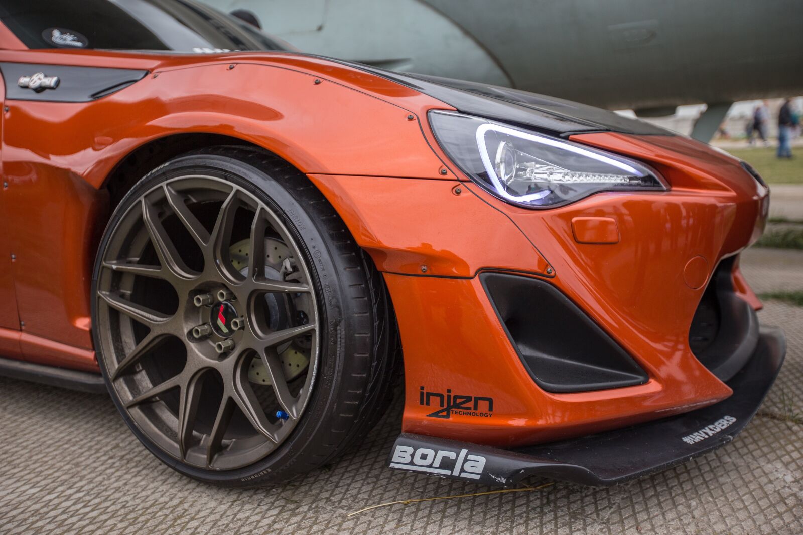 Canon EF 16-35mm F2.8L II USM sample photo. Sports car, wheel, low photography