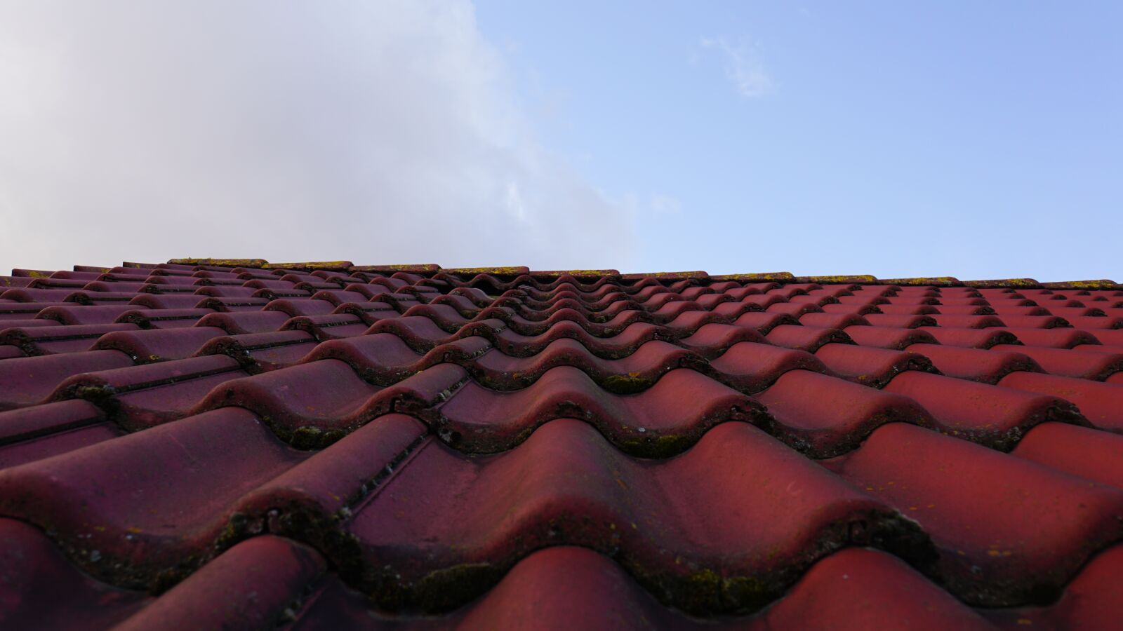 Sony E 18-200mm F3.5-6.3 OSS LE sample photo. Storm damage, tile, roof photography