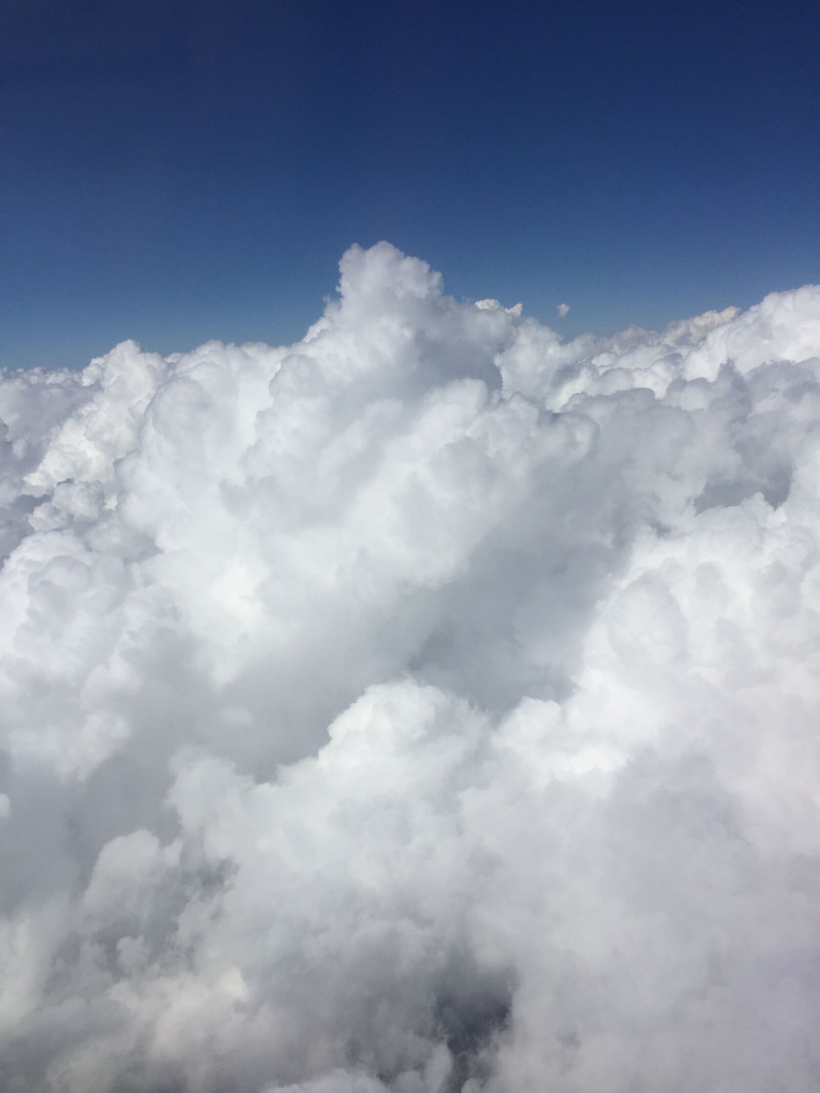 Apple iPhone 6 sample photo. Clouds, blue sky, white photography
