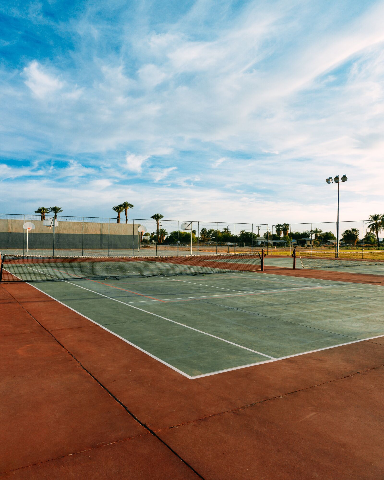 Sony a6000 sample photo. Tennis court, sky, tennis photography
