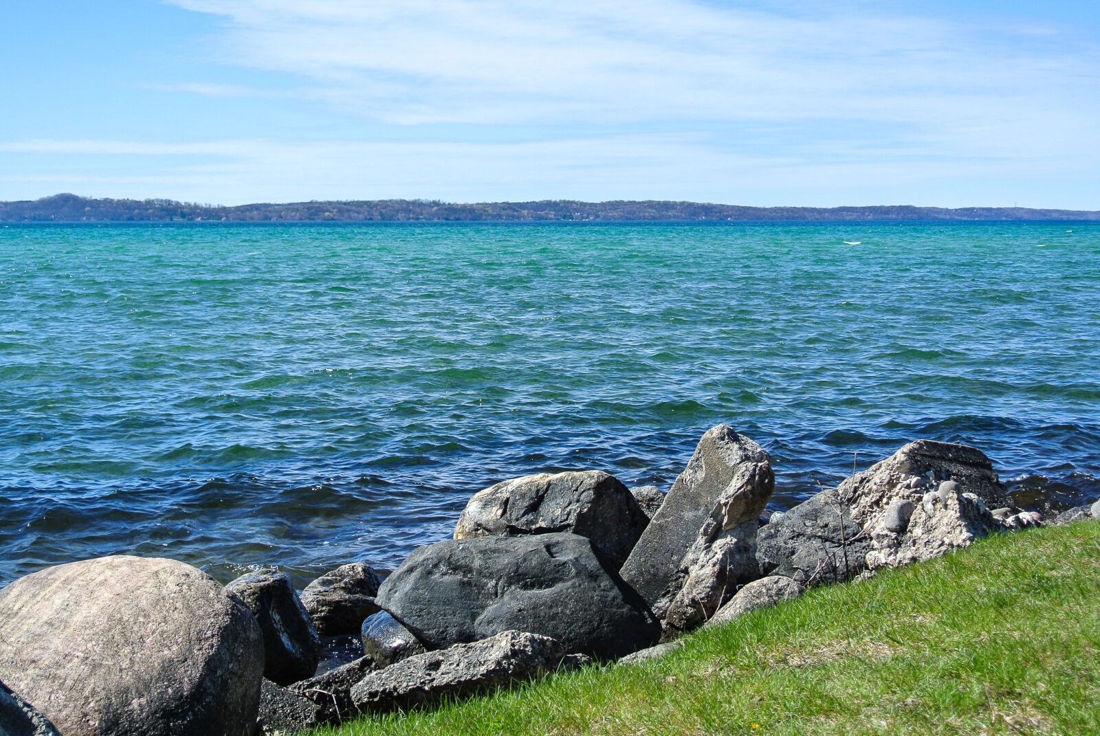Nikon 1 Nikkor VR 10-30mm F3.5-5.6 sample photo. Alden, michigan, blue, water photography