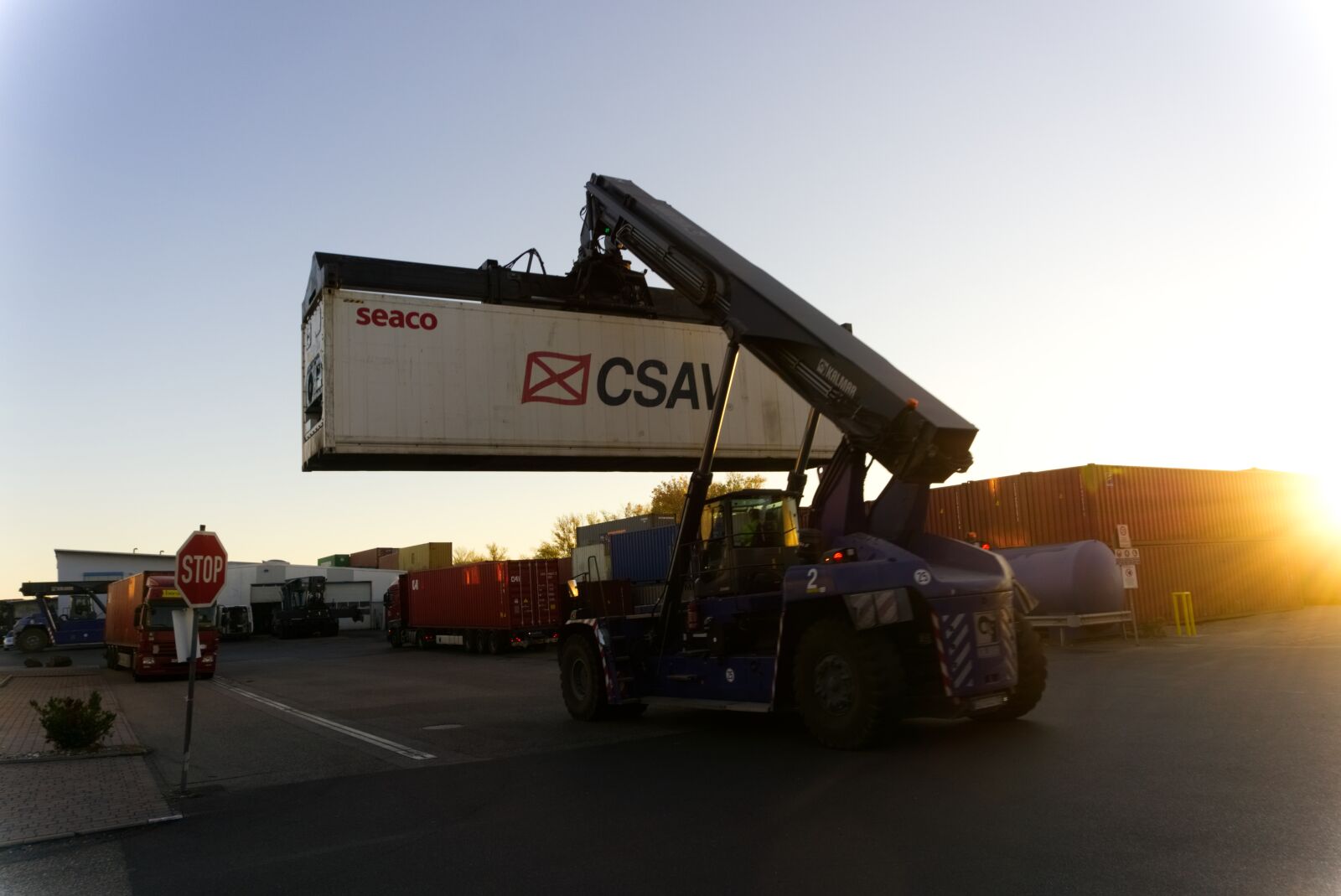 Sony a6000 sample photo. Container, loading crane, sunrise photography