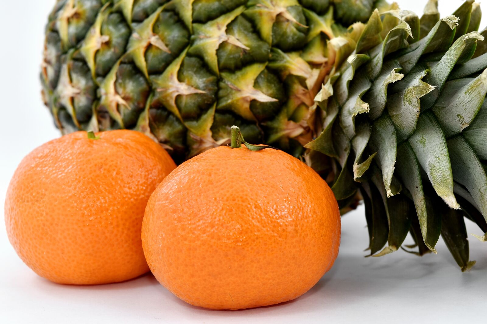 Nikon D5500 sample photo. Pineapple, side view, tangerine photography