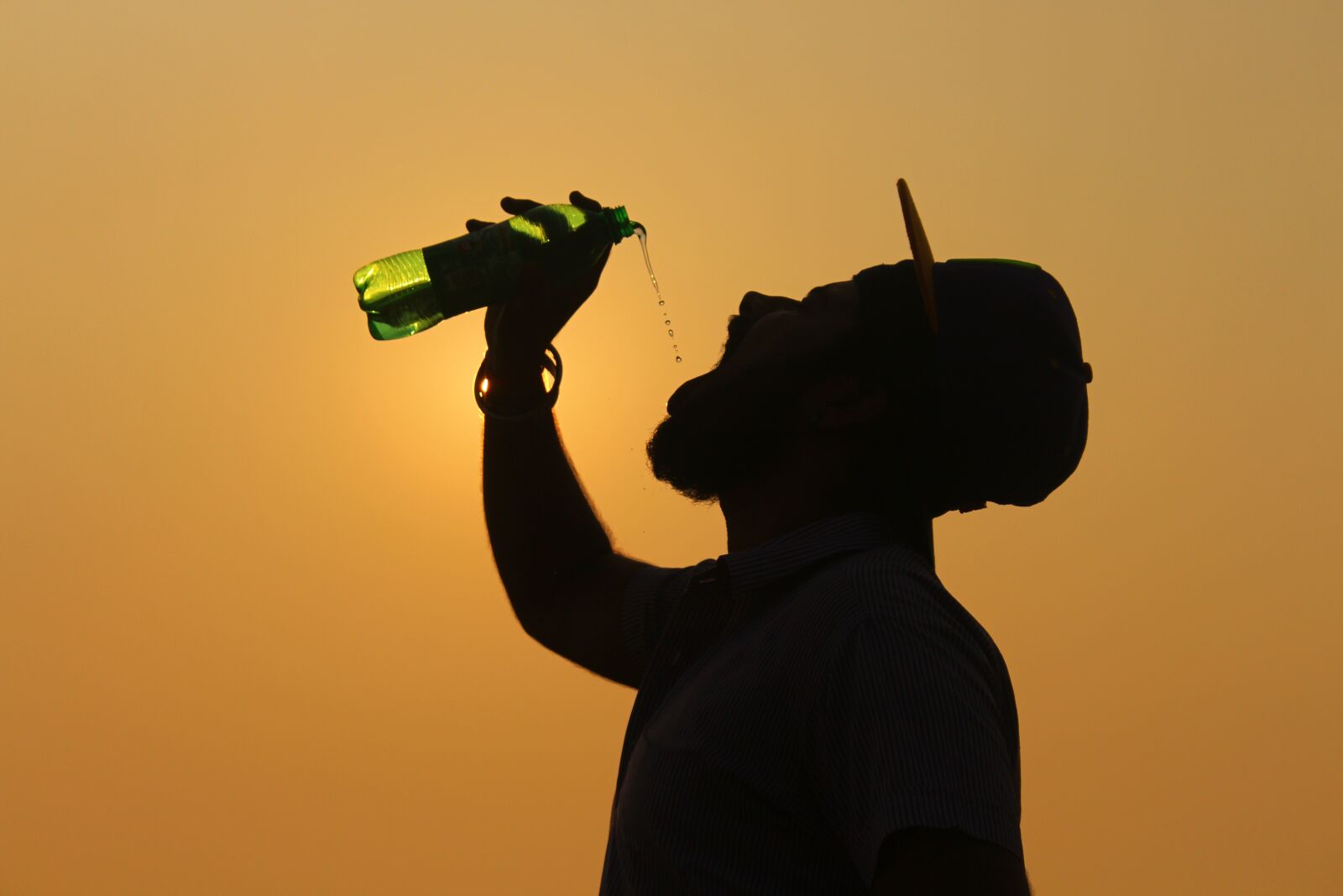 Canon EOS 700D (EOS Rebel T5i / EOS Kiss X7i) sample photo. Silhouette, sun, morning photography