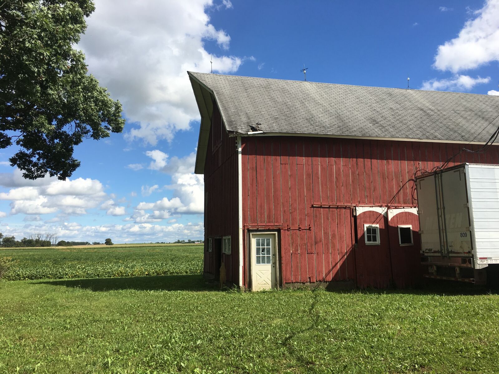 Apple iPhone 6s Plus sample photo. Old barn, red barn photography