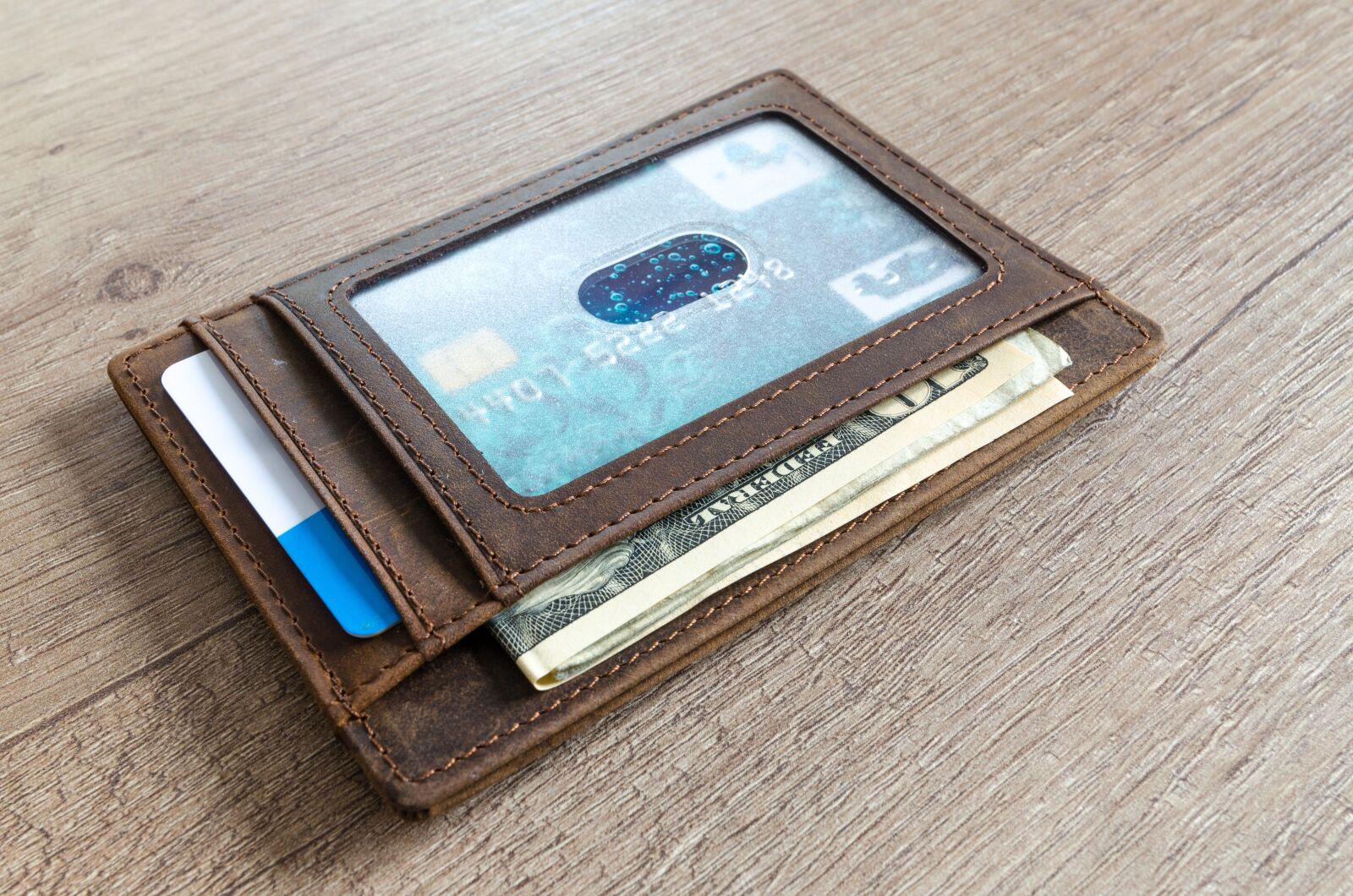 Nikon D5100 sample photo. Leather, finance, money photography