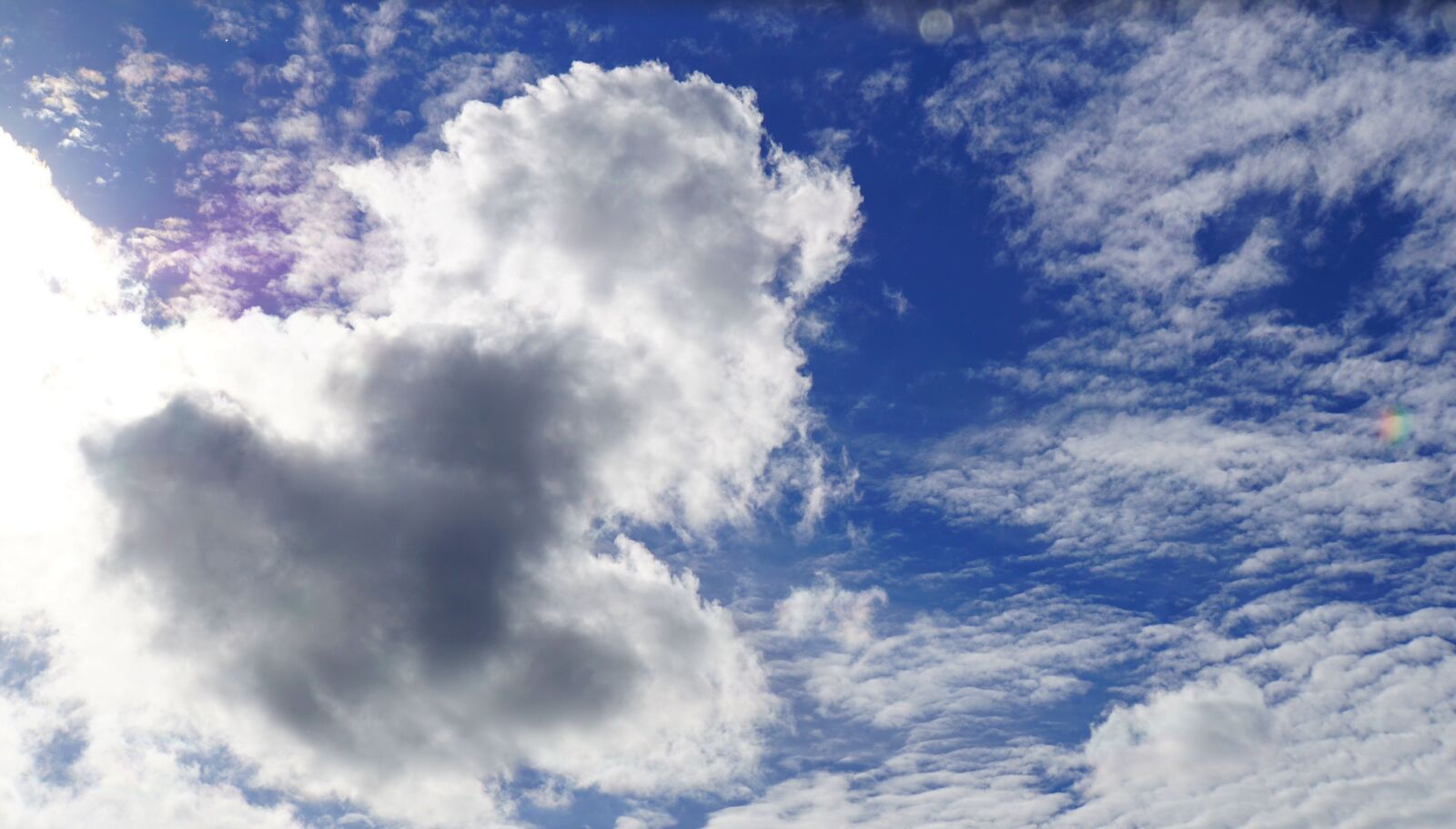 Sony E 18-200mm F3.5-6.3 OSS LE sample photo. Sky, clouds, the sun photography