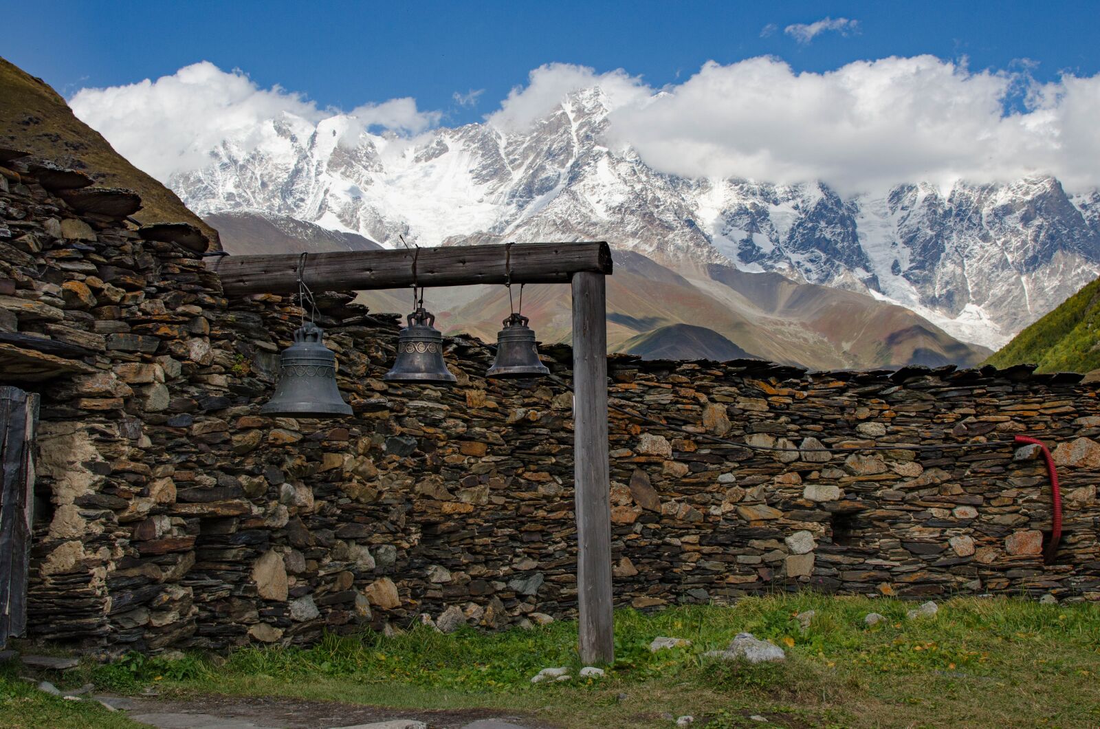Nikon D5100 sample photo. Mountains, temple, bell photography
