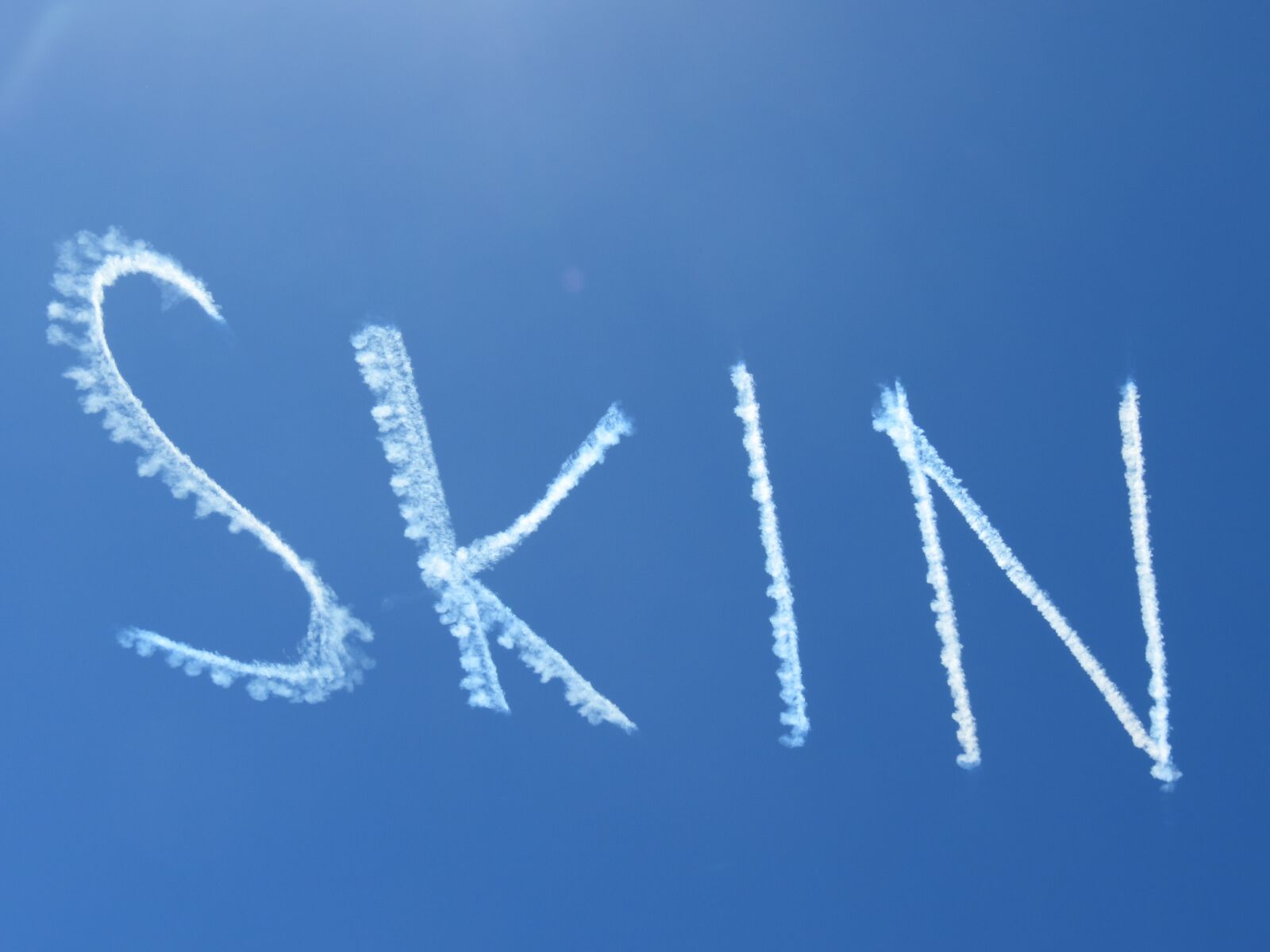 Canon PowerShot SX40 HS sample photo. Sky, blu, skin photography