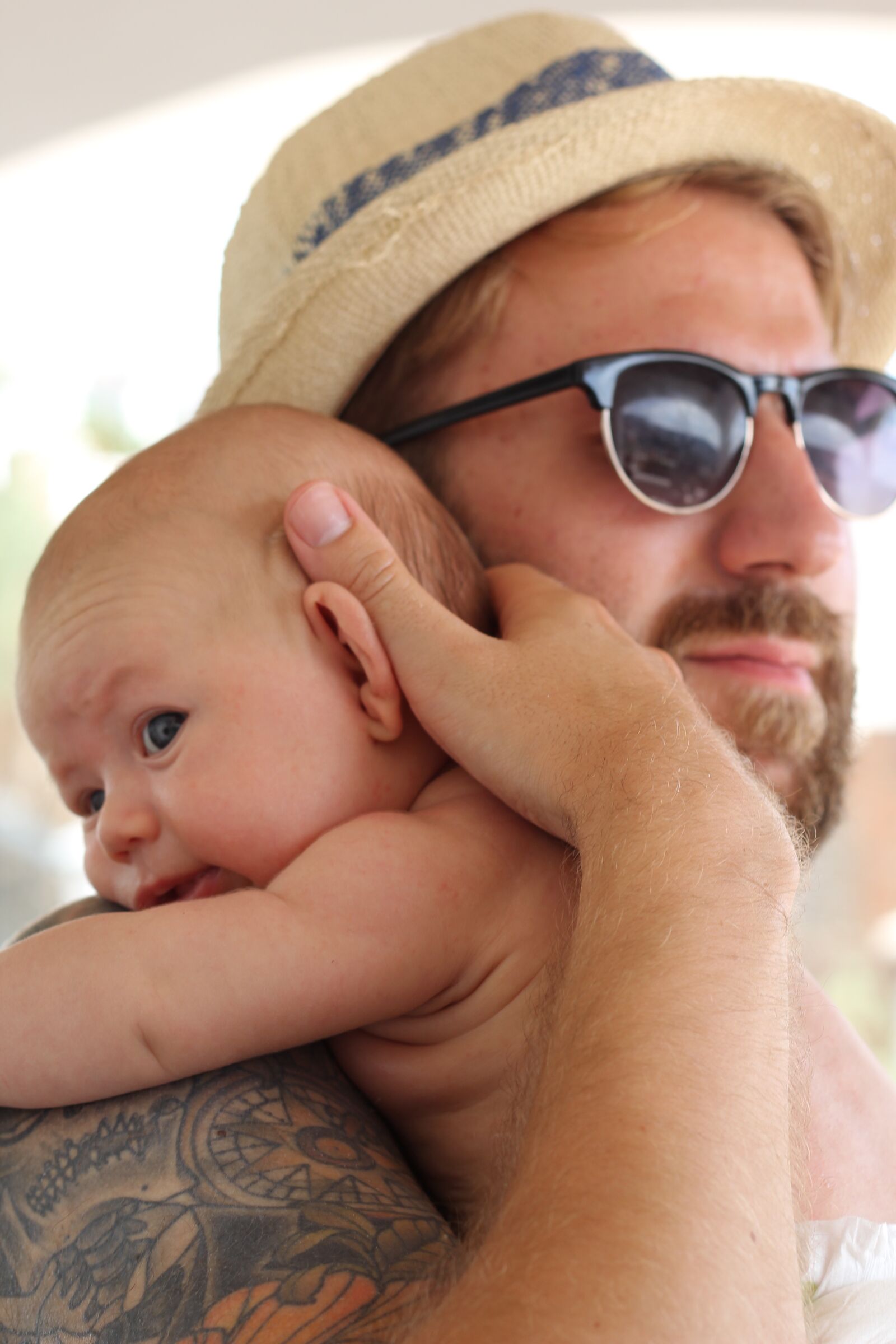 Canon EOS 60D + Canon EF 50mm F1.8 II sample photo. Father, son, sunglasses photography