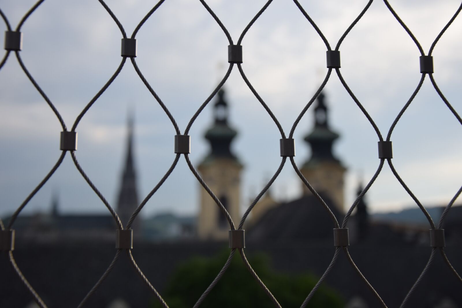 Nikon D3300 sample photo. Fence, church, towers photography