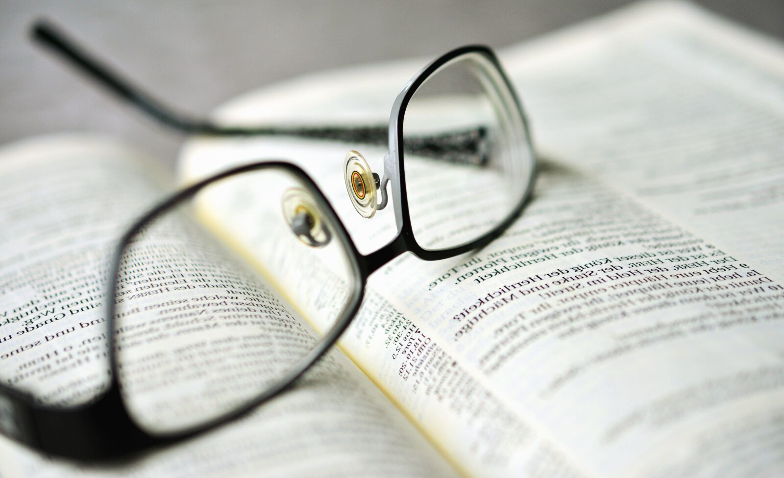 Nikon D5200 sample photo. Eyeglasses, book, magnification, paper photography