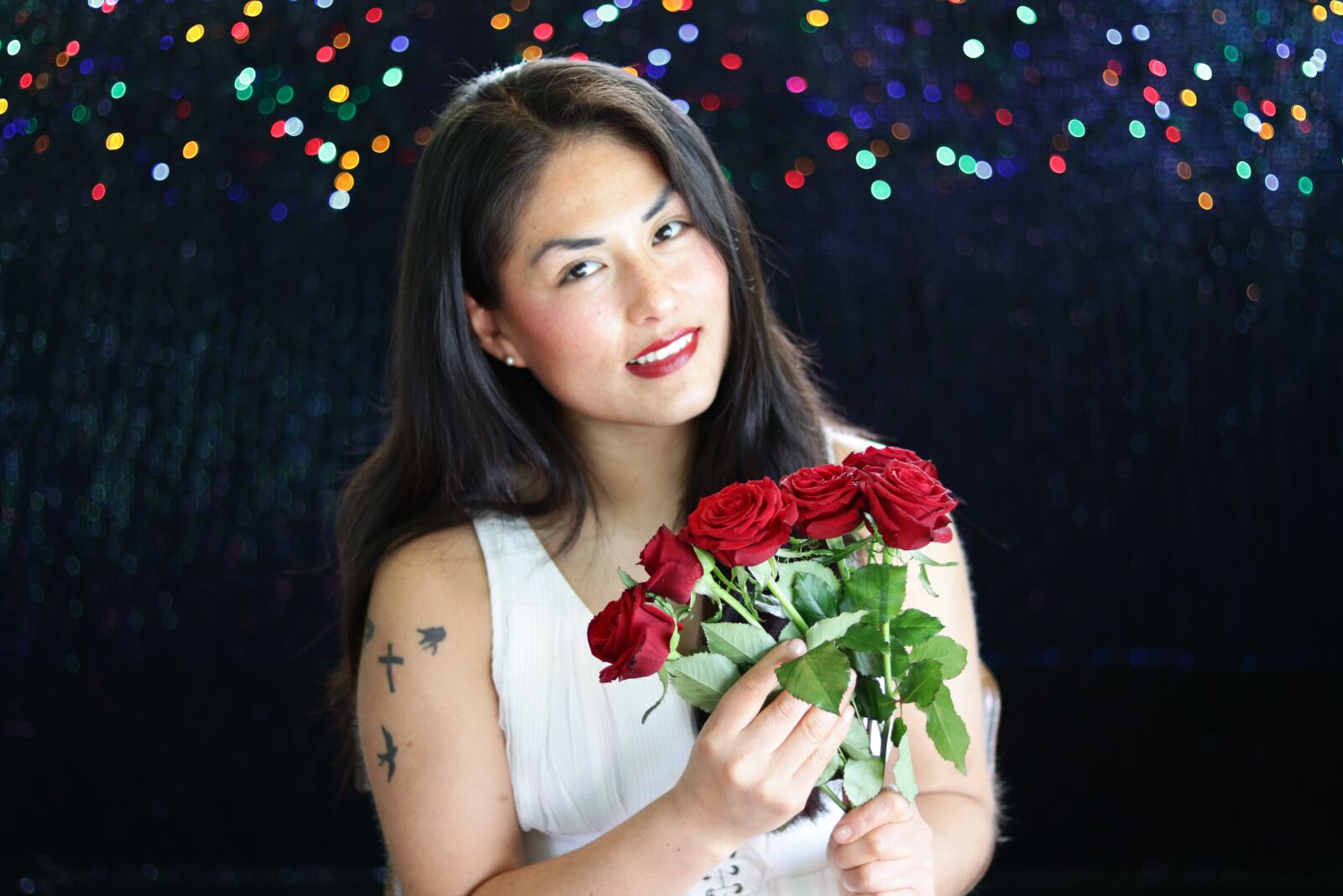Canon EOS 80D + Canon EF 50mm F1.8 STM sample photo. Woman, red roses, bokeh photography
