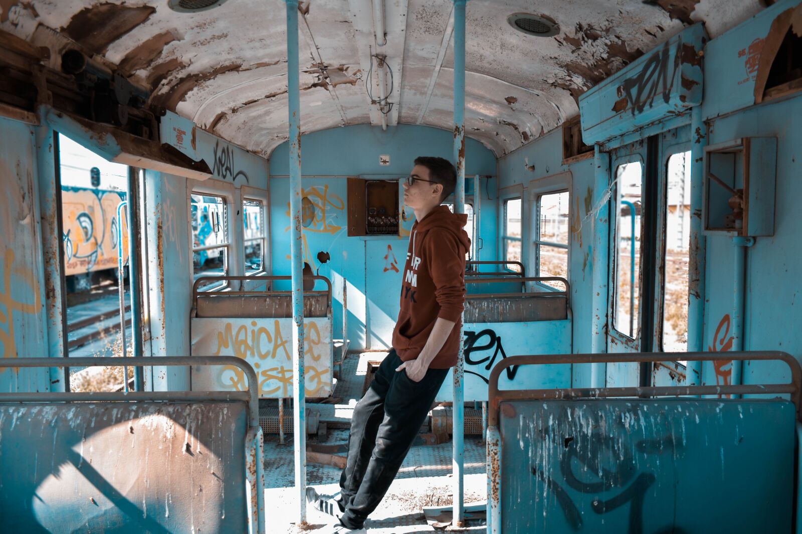 Nikon D5600 sample photo. Young, guy, train photography