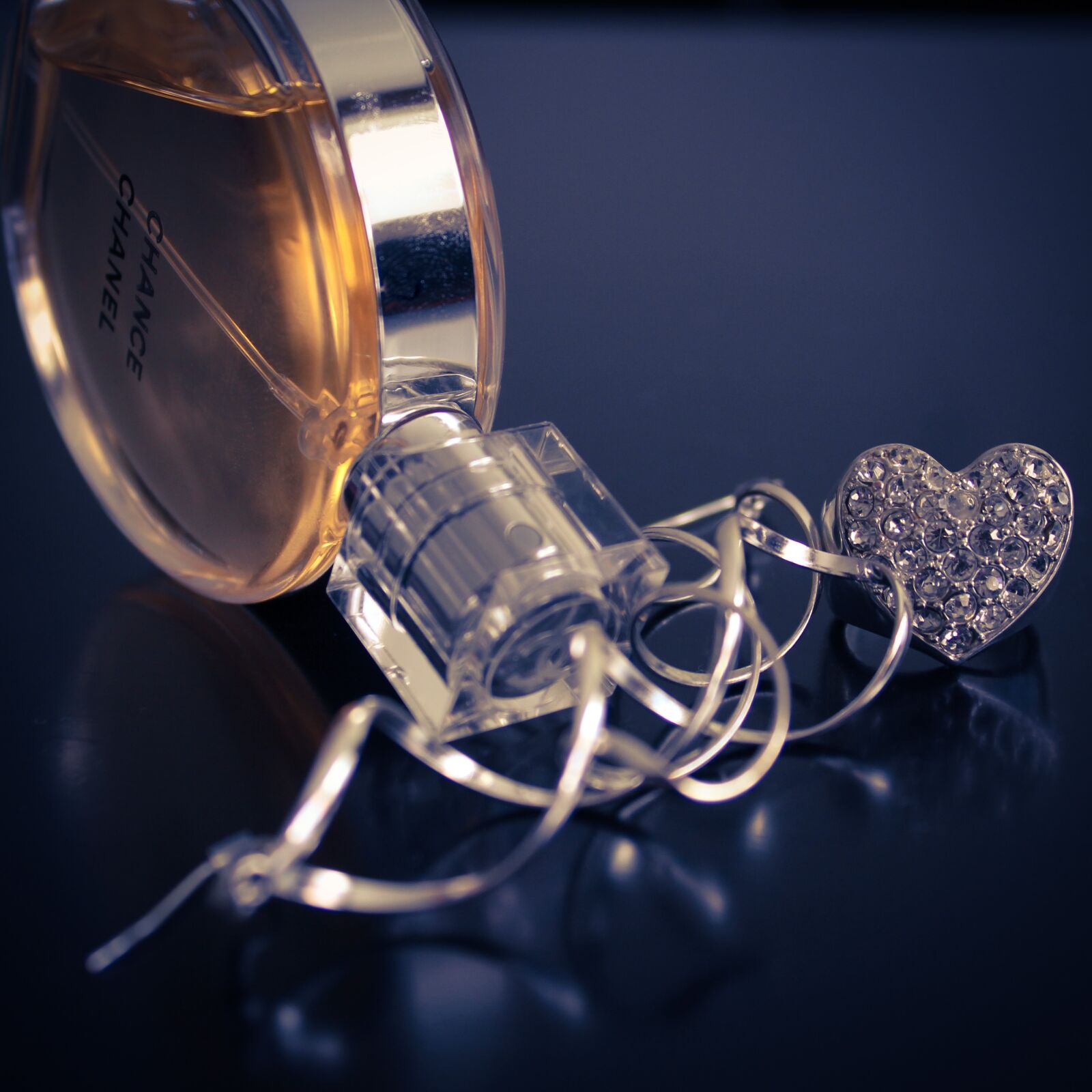 Canon EF-S 18-55mm F3.5-5.6 IS sample photo. Gold, jewelry, perfume photography