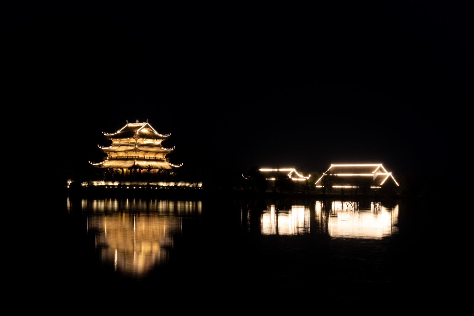 Canon EF-M 15-45mm F3.5-6.3 IS STM sample photo. Pagodas, river, night photography