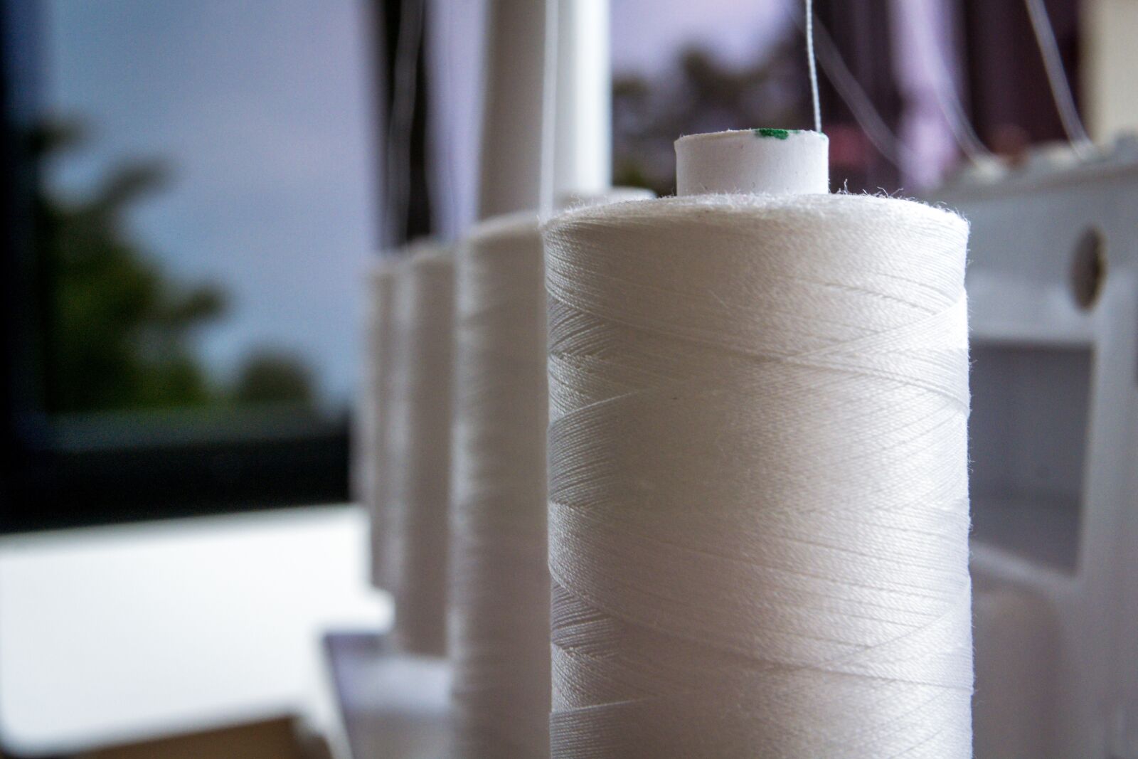 Sony a6000 + Sony E 35mm F1.8 OSS sample photo. Sew, sewing machine, thread photography