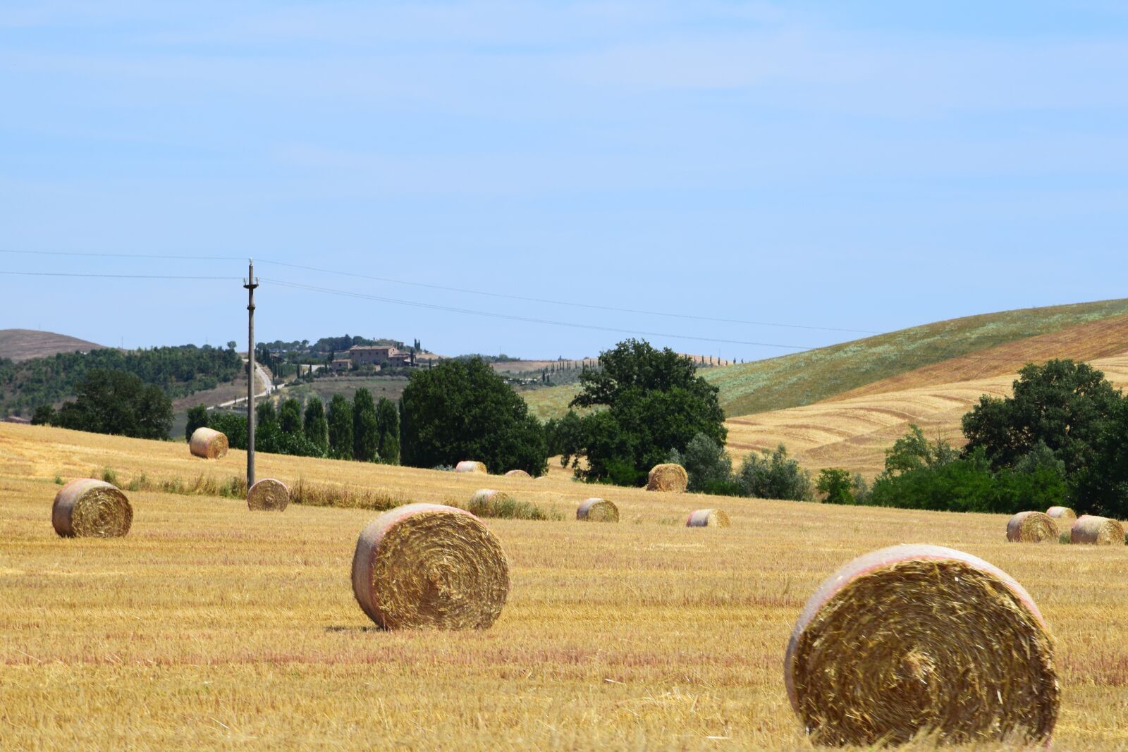 Nikon D3300 sample photo. Hay bales, fields, sky photography