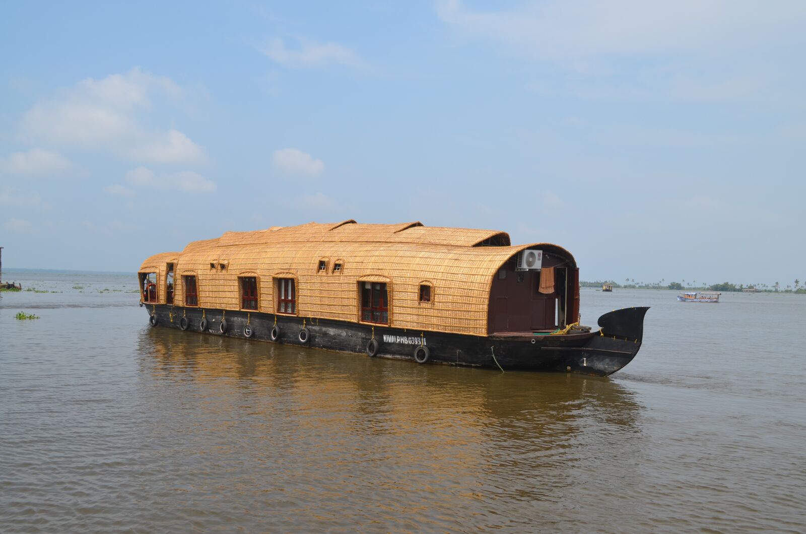 Nikon D5100 sample photo. Boat, river, water photography