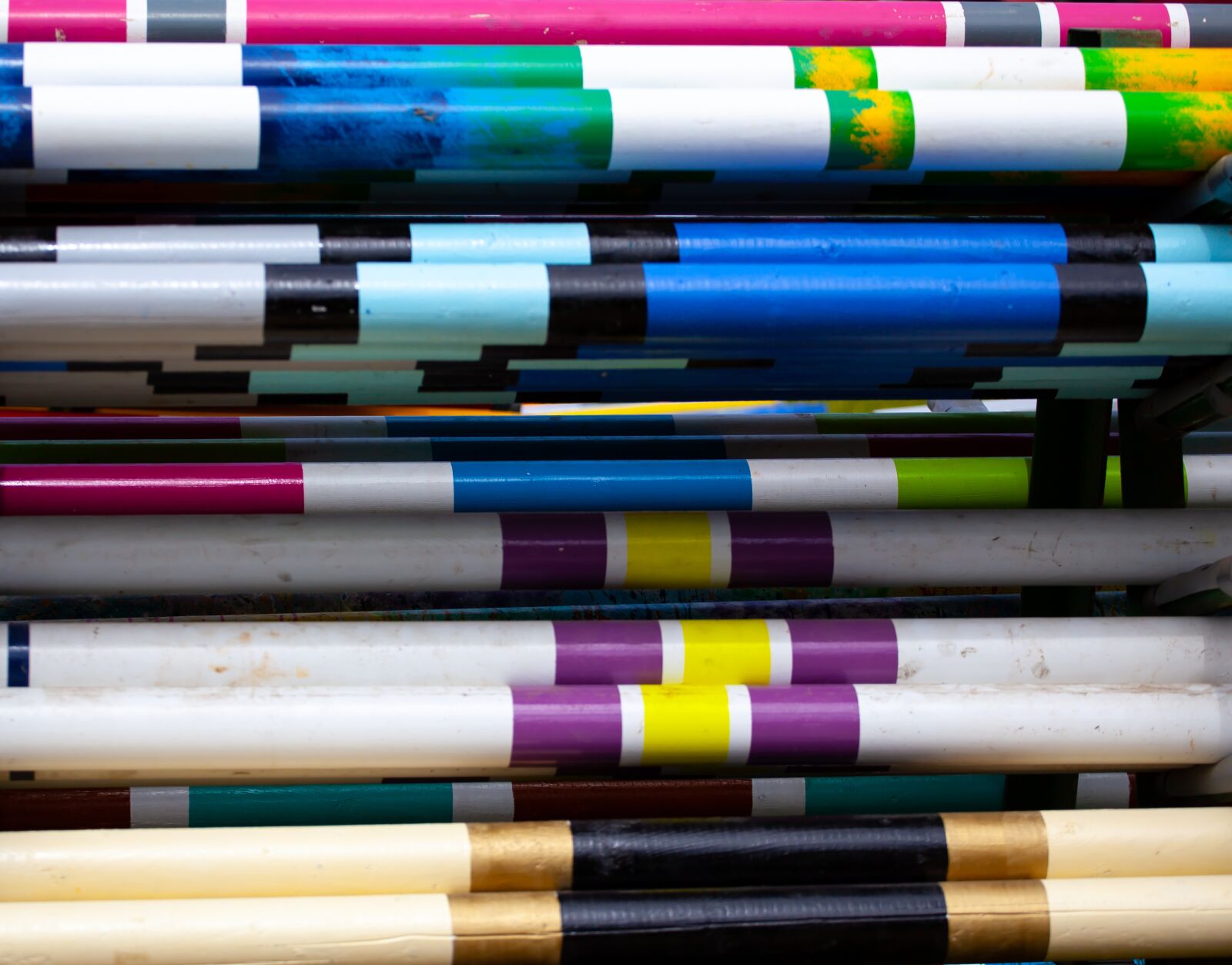 Canon EF 70-200mm F4L USM sample photo. Colourful, poles, wooden poles photography