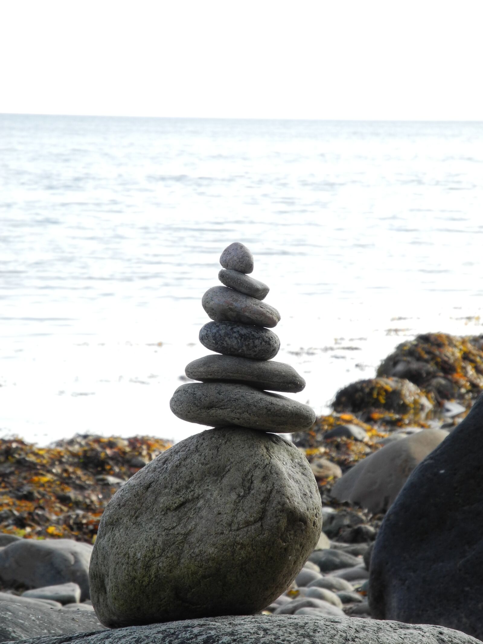 Nikon Coolpix P7000 sample photo. Stones, denmark, sea photography