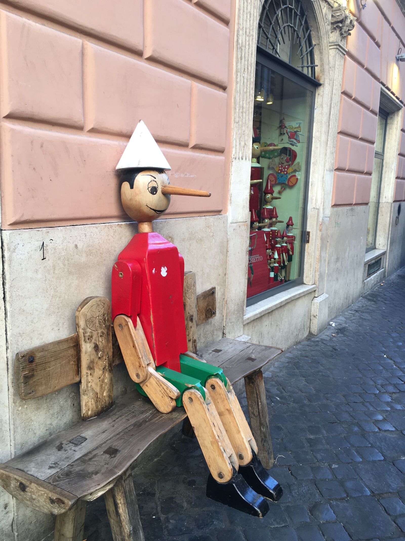 Apple iPhone 6s Plus sample photo. Rome, pinocchio, toy photography