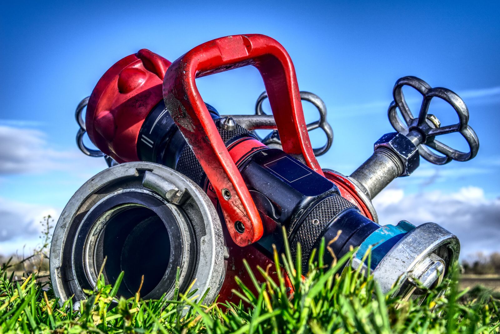 Sony a6000 + Sony E 35mm F1.8 OSS sample photo. Fire hose, valve, distributor photography