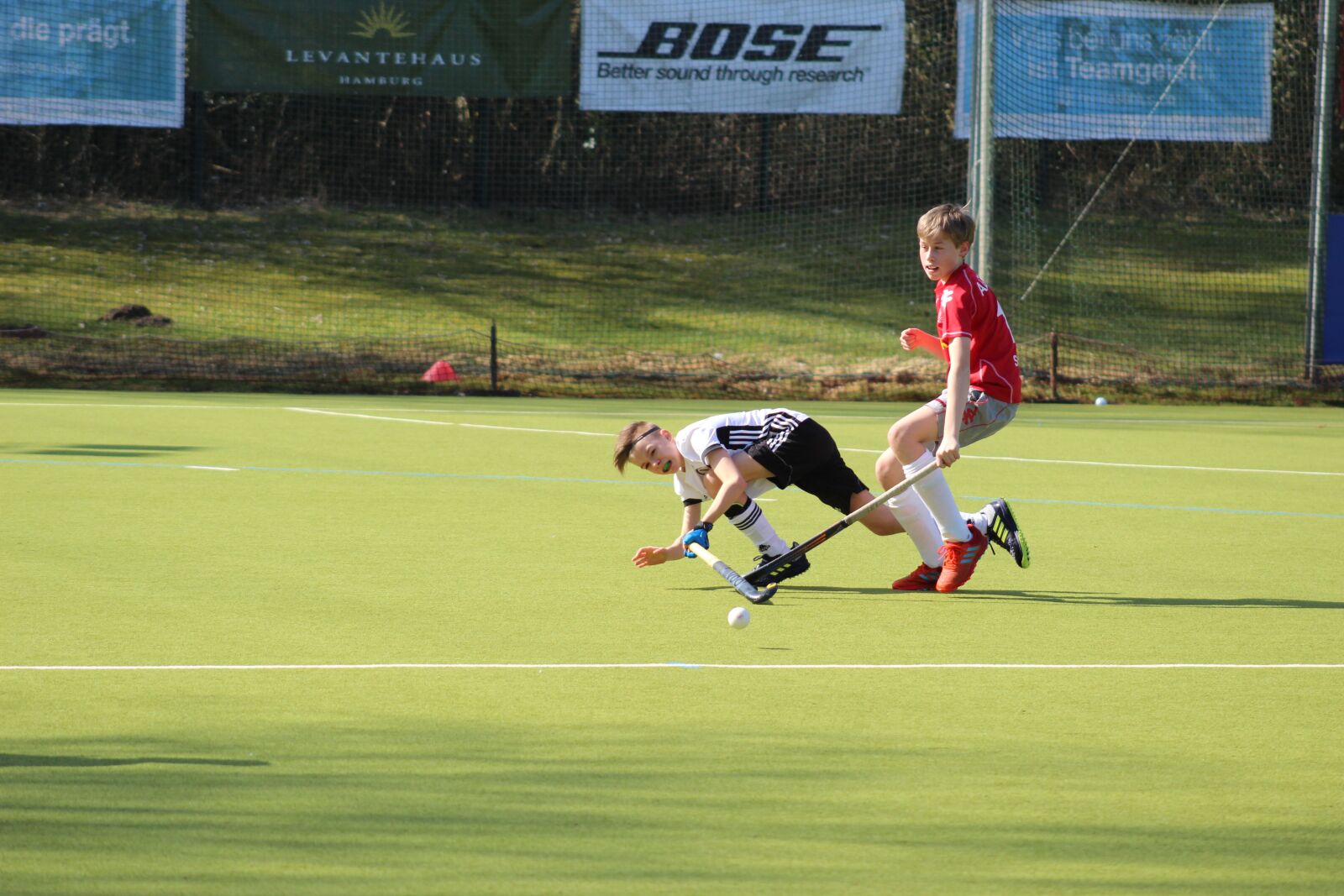 Canon EF75-300mm f/4-5.6 sample photo. Competition, hockey, field hockey photography