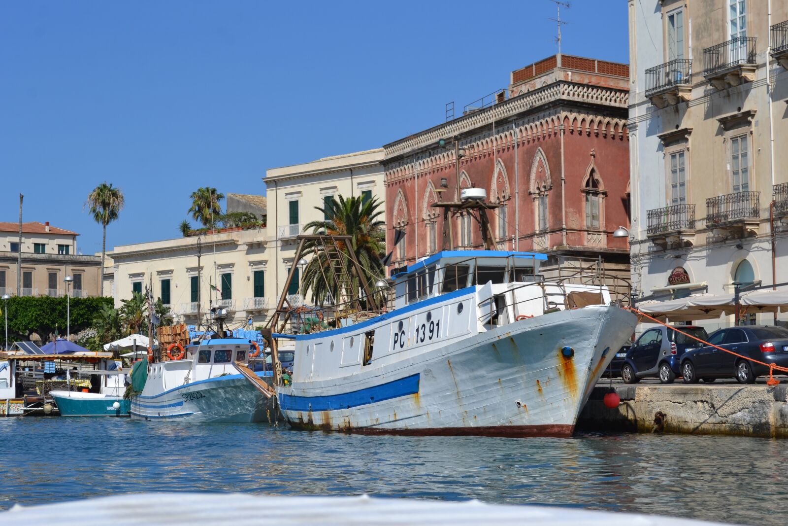 Nikon D3100 sample photo. Fishing boat, sicily, old photography