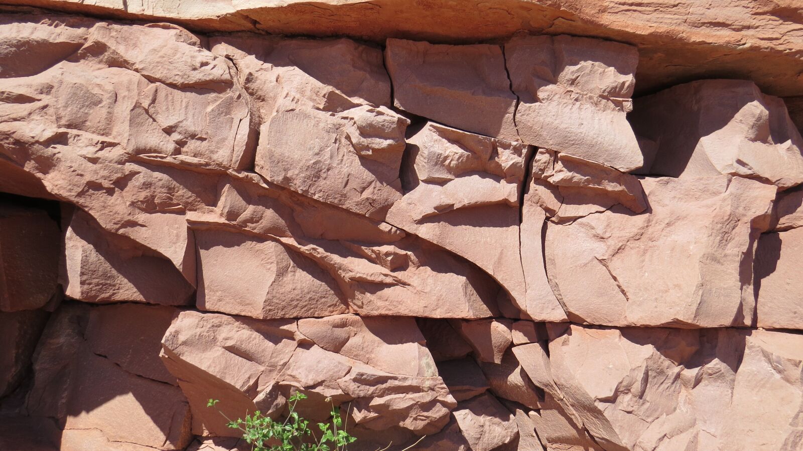 Canon PowerShot SX50 HS sample photo. Rock wall, red stone photography
