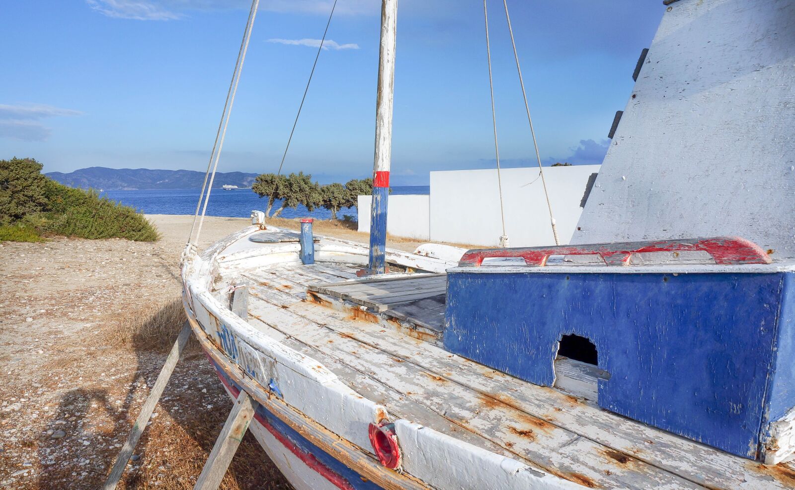 Sony Alpha NEX-5T sample photo. Milos, old fishing boat photography