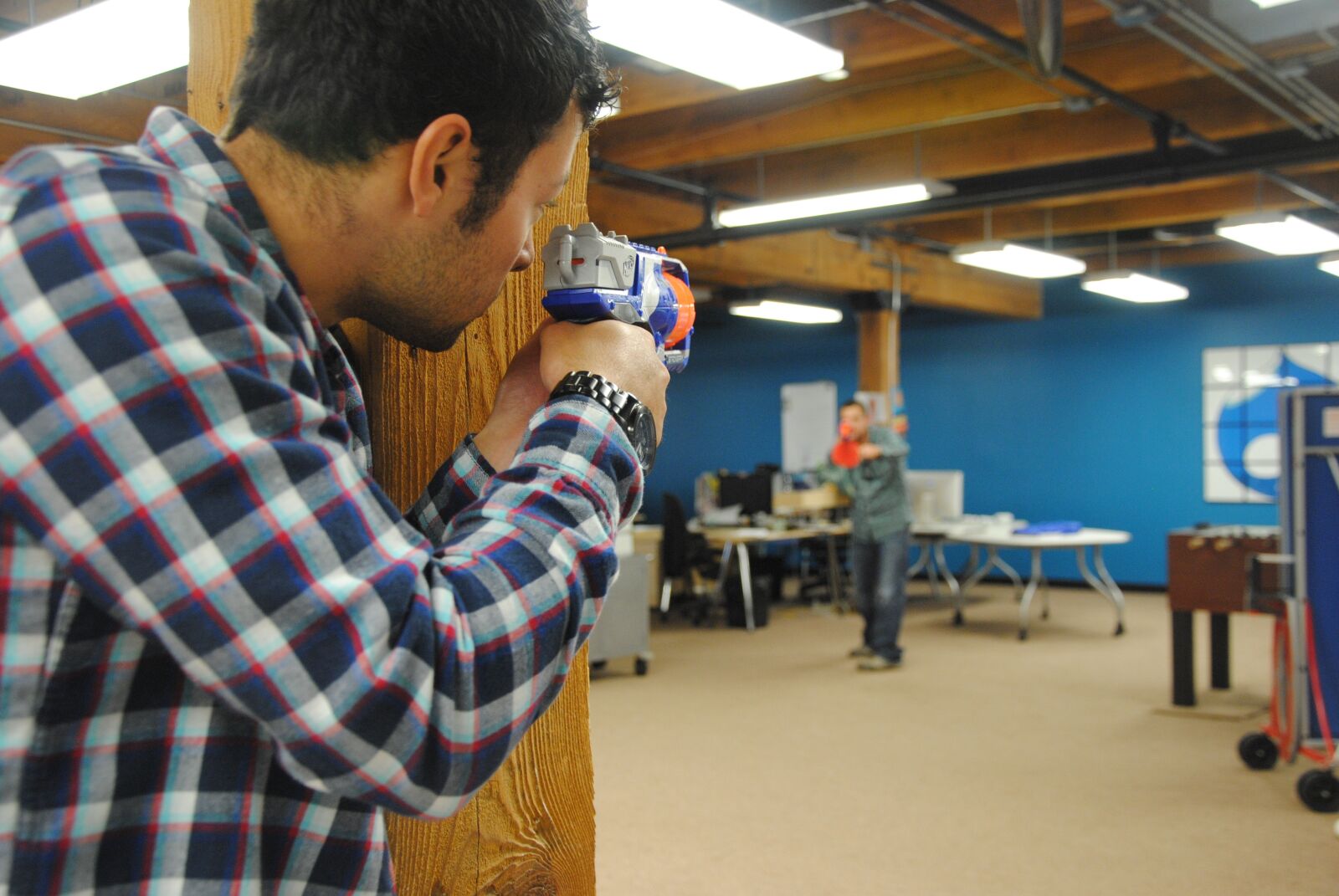 Nikon D3000 sample photo. Nurf gun, aim, concentration photography