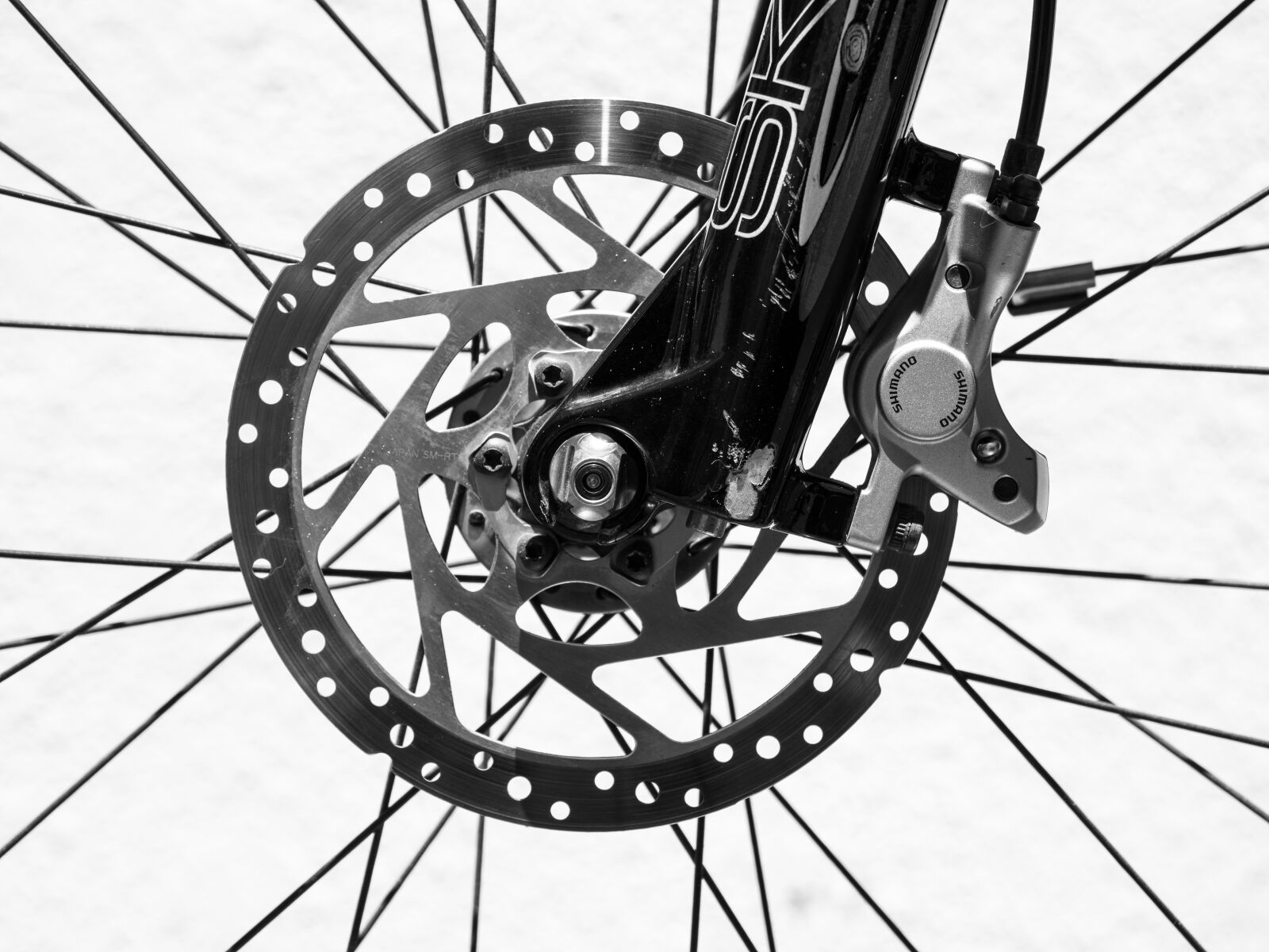 Olympus M.Zuiko Digital ED 12-100mm F4.0 IS Pro sample photo. Mountain bike disk brake photography