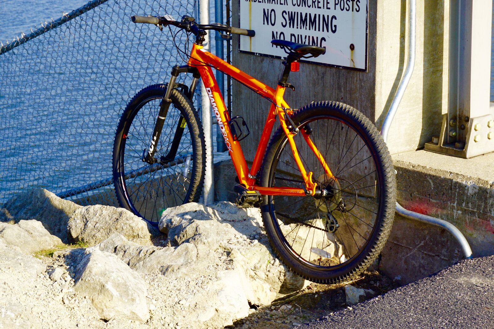 Sony a5100 sample photo. Bike, bicycle, water photography
