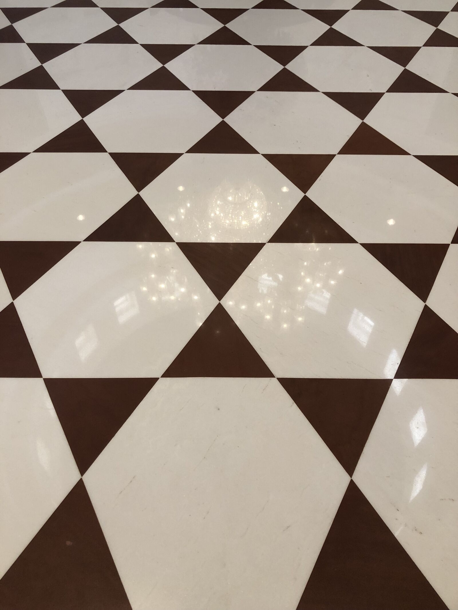 iPhone 8 Plus back dual camera 3.99mm f/1.8 sample photo. Tiles, texture, brown photography