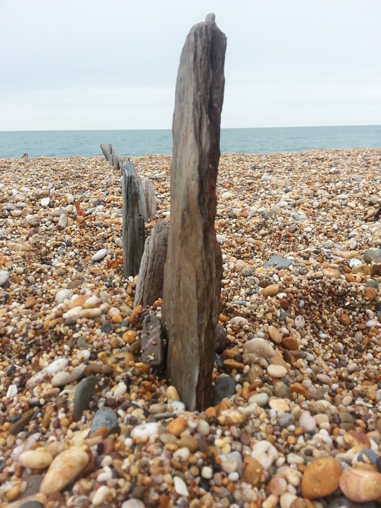 Samsung Galaxy S3 sample photo. Beach, pattern, pebbles, standing photography