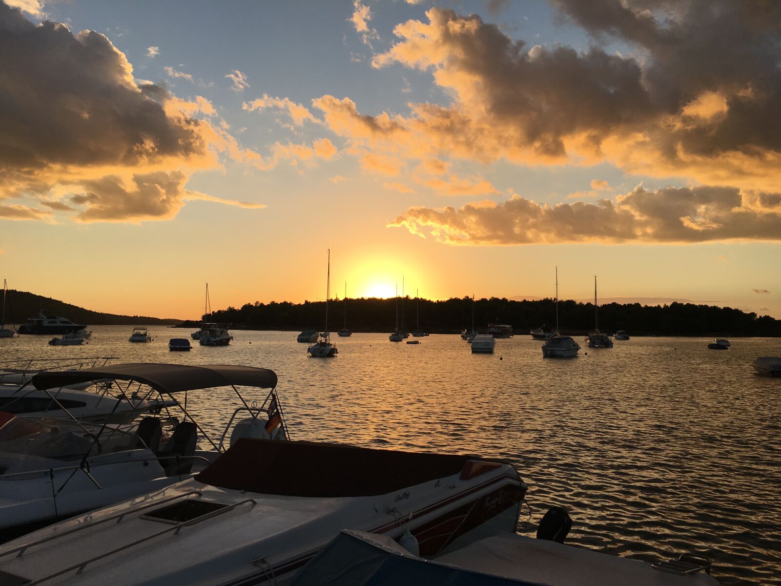 Apple iPhone 6s sample photo. Sunset, sea, boat photography