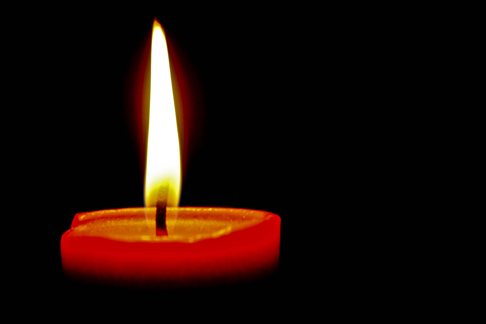 Canon EOS 1000D (EOS Digital Rebel XS / EOS Kiss F) sample photo. Black, candle, dark, fire photography