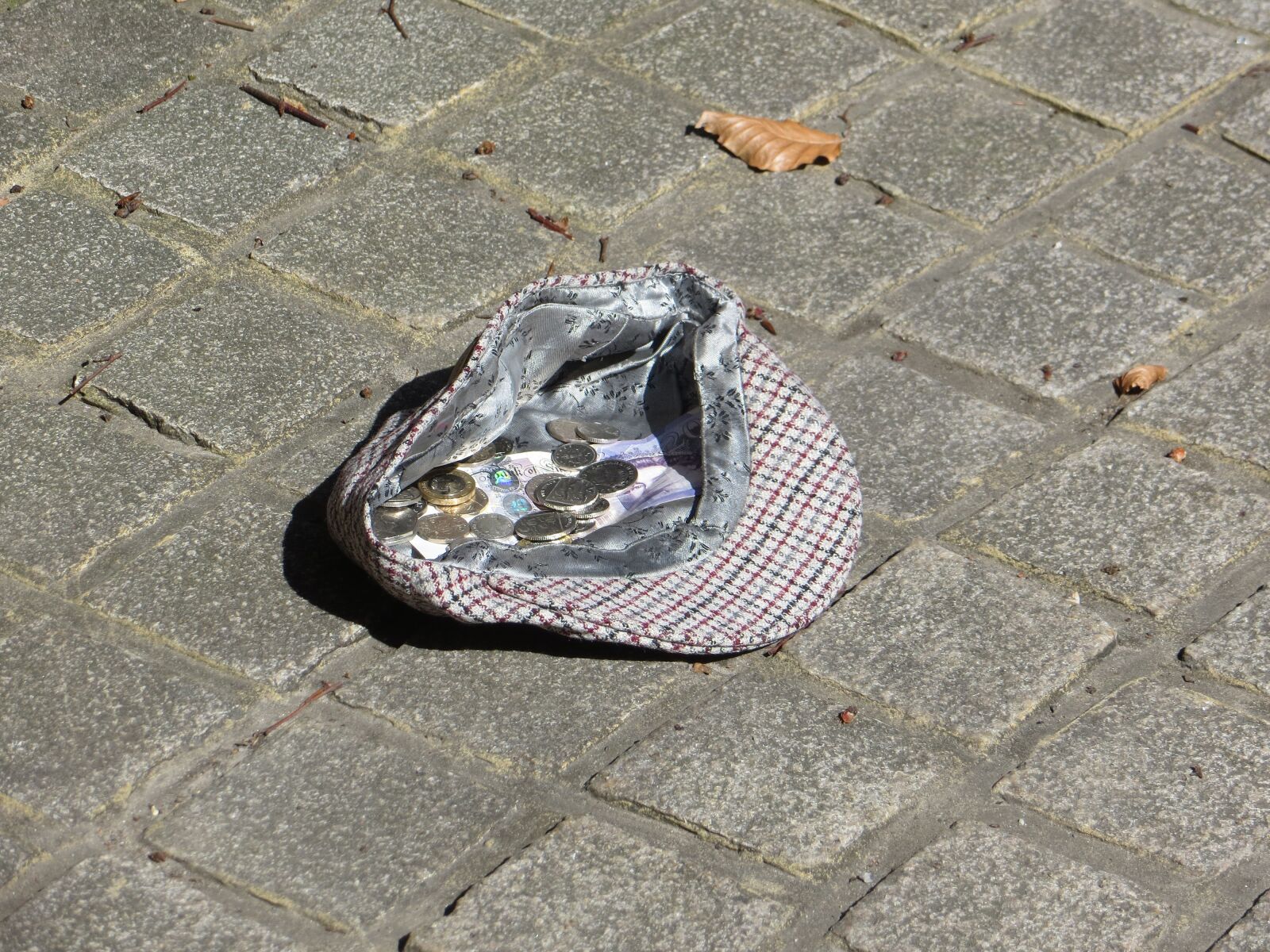 Canon PowerShot SX240 HS sample photo. Busker, hat, money photography