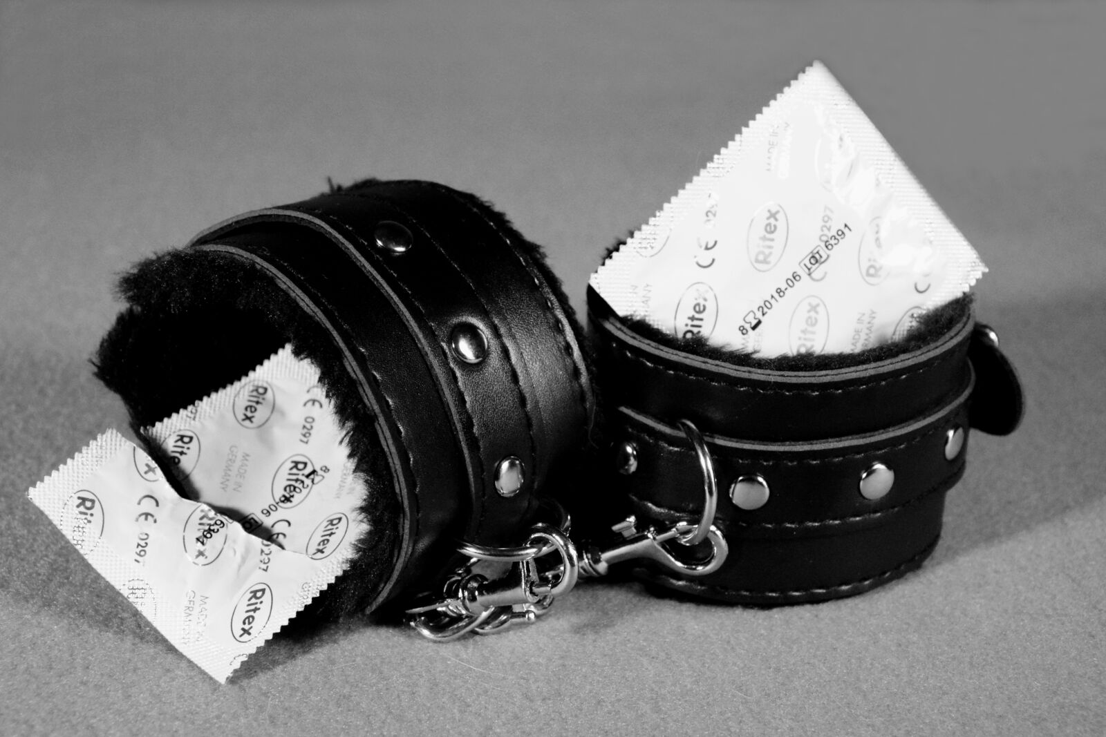 Nikon D5200 sample photo. Condoms, condom, handcuffs photography