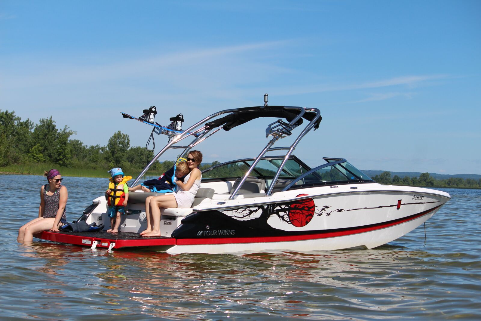 Canon EF-S 55-250mm F4-5.6 IS sample photo. Boat, anchor, swimming photography